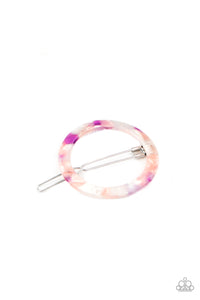 In The Round - Purple/Pink - Paparazzi Accessories - Item #P7SS-PRXX-092XX Featuring a colorful tortoise shell inspired pattern, a circular acrylic frame gently pulls back the hair for a retro inspired look. Features a clamp barrette closure.  Sold as one individual hair clip.