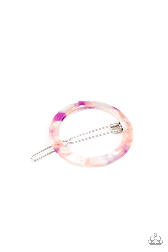 In The Round - Purple/Pink - Paparazzi Accessories - Item #P7SS-PRXX-092XX Featuring a colorful tortoise shell inspired pattern, a circular acrylic frame gently pulls back the hair for a retro inspired look. Features a clamp barrette closure.  Sold as one individual hair clip.