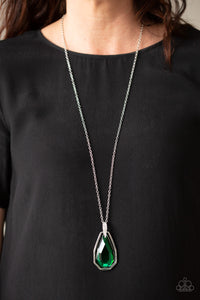 Maven Magic - Green - Paparazzi Accessories -  A dramatically oversized green gem and edgy silver frame swing from a glassy white rhinestone fitting at the bottom of a lengthened silver chain for a glamorous look. Features an adjustable clasp closure.  Sold as one individual necklace. Includes one pair of matching earrings.