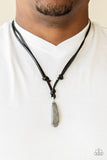 Am I METEORITE? - Silver - Paparazzi Accessories  A chunk of hematite swings from the bottom of a lengthened strand of black leather cording, creating an urban pendant. Features an adjustable sliding knot closure. Size may vary.  Sold as one individual necklace.