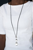 Embrace The Journey - Black - Paparazzi Accessories  Delicately hammered in a glistening shimmer, asymmetrical silver frames link at the bottom of a lengthened black suede strand for a bold artisanal look. Features an adjustable clasp closure.  Sold as one individual necklace. Includes one pair of matching earrings.