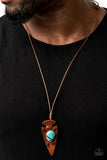 Hold Your ARROWHEAD Up High - Blue - Paparazzi Accessories Shiny brown cording crisscrosses across the front of an earthy turquoise stone, knotting the colorful accent in place across the front of a brown leather arrowhead pendant for an earthy look. Features an adjustable sliding knot closure.  Sold as one individual necklace.  2020 Convention  P2UR-BLXX-047XX