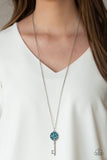 Key Keepsake - Blue - Paparazzi Accessories - Encrusted in glassy blue and glittery hematite rhinestones, a sparkling silver key swings from the bottom of a lengthened silver chain for a whimsical look. Features an adjustable clasp closure.  Sold as one individual necklace. Includes one pair of matching earrings.