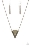 Ancient Arrow - Brass - Paparazzi Accessories -  Stamped and studded in indigenous inspired textures, a stacked triangular pendant swings from the bottom of an elongated brass chain for a trendy tribal look. Features an adjustable clasp closure.  Sold as one individual necklace. Includes one pair of matching earrings.