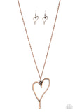 HEARTS So Good - Copper - Paparazzi Accessories - Item #P2WH-CPXX-153XX An asymmetrical copper heart charm swings from the bottom of a lengthened copper chain, creating a whimsical pendant. Features an adjustable clasp closure.  Sold as one individual necklace. Includes one pair of matching earrings.