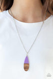 Going Overboard - Purple - Paparazzi Accessories -  Dipped in a purple finish, a wooden teardrop pendant swings from the bottom of a lengthened silver chain for a colorful earthy look. Features an adjustable clasp closure.  Sold as one individual necklace. Includes one pair of matching earrings.