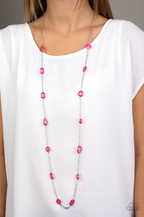 Glassy Glamorous - Pink - Paparazzi Accessories - Item #P2WH-PKXX-320XX Featuring sleek silver fittings, an array of glassy pink gemstones trickle along a shimmery silver chain for a glamorous look. Features an adjustable clasp closure.  Sold as one individual necklace. Includes one pair of matching earrings.