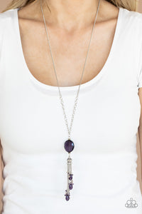 Fringe Flavor - Purple - Paparazzi Accessories - Item #P2RE-PRXX-174XX A faceted purple gem attaches to the bottom of a lengthened silver chain featuring sections of airy chain links. Infused with dainty silver and matching purple beads, shimmery silver chains stream from the bottom of a hematite dotted silver cap, creating an edgy tassel. Features an adjustable clasp closure.  Sold as one individual necklace. Includes one pair of matching earrings.