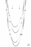 Open for Opulence - Silver - Paparazzi Accessories -  Hematite crystal-like beads trickle along three mismatched silver chains, creating shimmery layers across the chest. Features an adjustable clasp closure.  Sold as one individual necklace. Includes one pair of matching earrings.  P2RE-SVXX-322XX