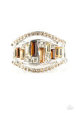 Treasure Chest Charm - Brown - Paparazzi Accessories  Topaz rhinestone encrusted bands flank a row of emerald cut glass beads in shades of brown and white for a regal look. Features a stretchy band for a flexible fit.  Sold as one individual ring.