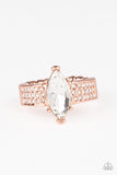 Icy Iridescence - Copper - Paparazzi Accessories Featuring a regal marquise style cut, a glittery white rhinestone is pressed into the center of a dainty shiny copper band encrusted in dainty white rhinestones for a timeless look. Features a dainty stretchy band for a flexible fit.  Sold as one individual ring.