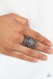 Adrift - Blue - Paparazzi Accessories - A dainty blue bead is pressed into a round silver frame swirling with studded details for a whimsical vibe. Features a stretchy band for a flexible fit.  Sold as one individual ring.