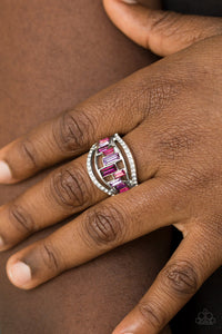 Treasure Chest Charm - Purple - Paparazzi Accessories - Item #P4ED-PRXX-028XX White rhinestone encrusted bands flank a row of emerald cut glass beads in shades of purple for a regal look. Features a stretchy band for a flexible fit.  Sold as one individual ring.