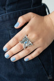 Flutter Flavor - Blue - Paparazzi Accessories - Item #P4WH-BLXX-183XX Lacy silver wings bloom from an opalescent blue cat's eye center, coalescing into a whimsical butterfly atop the finger. Features a stretchy band for a flexible fit.  Sold as one individual ring.