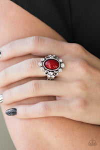 Noticeably Notable - Red - Paparazzi Accessories -  Item #P4RE-RDXX-091XX A polished red bead is pressed into a bubbly silver frame radiating with glassy white rhinestones for a notable finish. Features a stretchy band for a flexible fit.  Sold as one individual ring.