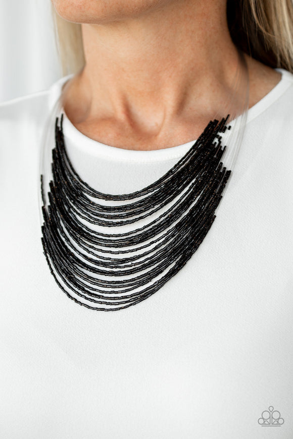 Catwalk Queen - Black - Paparazzi Accessories  Strand after strand of shimmering black seed beads fall together to create a bold statement piece. Features an adjustable clasp closure.  Sold as one individual necklace. Includes one pair of matching earrings.  #P2RE-BKXX-325XX