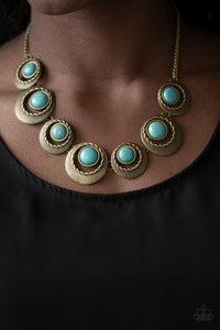 Lions, Tigers, and Bears - Brass - Paparazzi Accessories -  Featuring refreshing turquoise stone accents, hammered and textured circular frames link below the collar for an artisan inspired look. Features an adjustable clasp closure.  Sold as one individual necklace. Includes one pair of matching earrings.