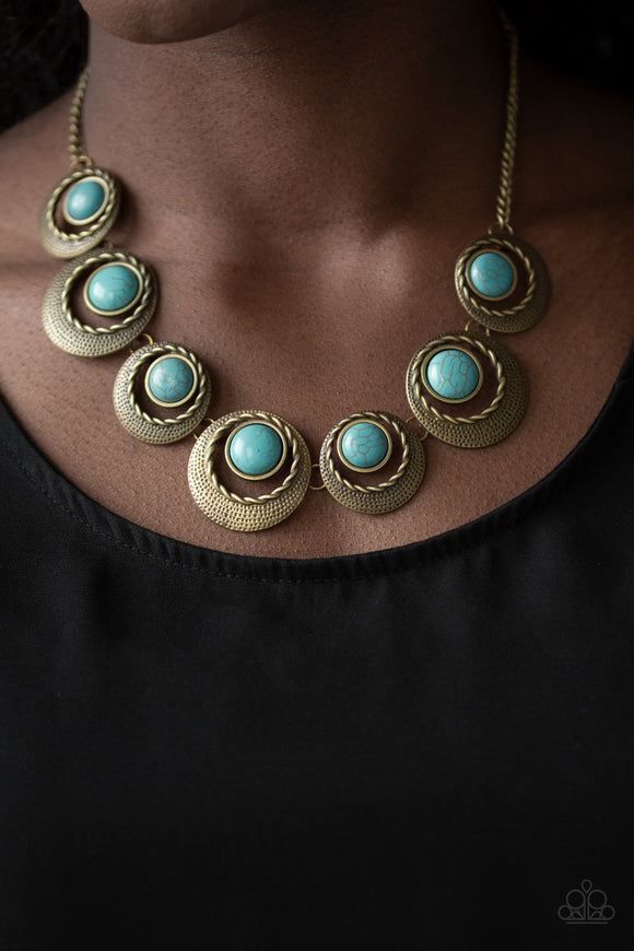 Lions, Tigers, and Bears - Brass - Paparazzi Accessories -  Featuring refreshing turquoise stone accents, hammered and textured circular frames link below the collar for an artisan inspired look. Features an adjustable clasp closure.  Sold as one individual necklace. Includes one pair of matching earrings.