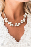 Love Story - White - Paparazzi Accessories  Dainty clusters of shimmery white pearls are dusted with sparkling rhinestones, creating a romantic, timeless design. Features an adjustable clasp closure.  Sold as one individual necklace. Includes one pair of matching earrings.  Get The Complete Look! Bracelet B0032: "I Do" (Sold Separately)  #P2RE-WTXX-001PK