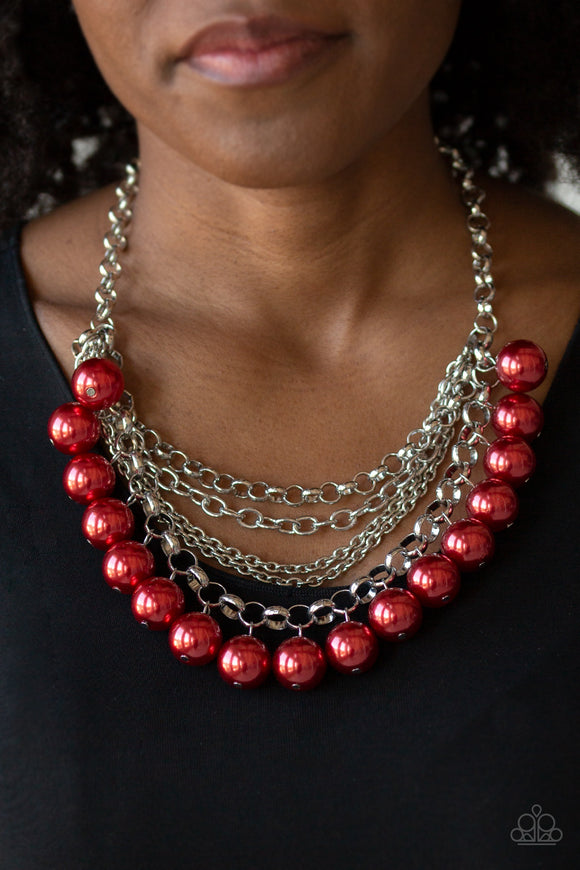One-Way WALL STREET - Red - Paparazzi Accessories  A collision of mismatched silver chains layer below the collar. Oversized red pearls dangle from the lowermost chain, creating a dramatically refined fringe for a statement-making finish. Features an adjustable clasp closure.  Sold as one individual necklace. Includes one pair of matching earrings.