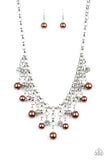 HEIR-headed - Brown - Paparazzi Accessories  A collection of bubbly brown pearls, glittery white rhinestones, and ornate silver beads swing from the bottom of a shimmery silver chain, creating a refined fringe below the collar. Features an adjustable clasp closure.  Sold as one individual necklace. Includes one pair of matching earrings.  #P2RE-BNXX-219XX