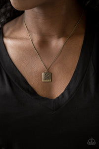 Back To Square One - Brass - Paparazzi Accessories -  A filigree filled brass frame is pressed into a larger hammered frame, creating a dainty pendant below the collar. Features an adjustable clasp closure.  Sold as one individual necklace. Includes one pair of matching earrings.