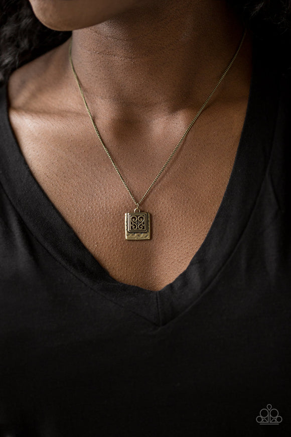 Back To Square One - Brass - Paparazzi Accessories -  A filigree filled brass frame is pressed into a larger hammered frame, creating a dainty pendant below the collar. Features an adjustable clasp closure.  Sold as one individual necklace. Includes one pair of matching earrings.