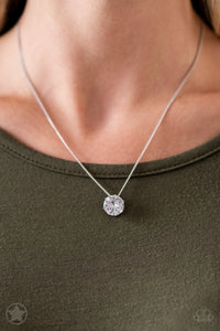 What A Gem - White - Paparazzi Accessories -  A single rhinestone sparkles brilliantly at the bottom of a dainty silver chain, creating a stunning solitaire design. Features an adjustable clasp closure.  Sold as one individual necklace. Includes one pair of matching earrings.