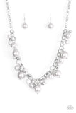 The Upstater - Silver - Paparazzi Accessories  Varying in size, bubbly silver pearls, classic silver beads, and shiny gray beads swing from the bottom of a glistening silver chain, creating a refined fringe below the collar. Features an adjustable clasp closure.  Sold as one individual necklace. Includes one pair of matching earrings.  P2WH-SVXX-252XX