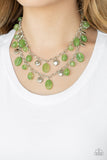 Rainbow Shine - Green - Paparazzi Accessories -  P2WH-GRXX-342XX  Infused with flat silver beads, an array of glassy green beads dangle from the bottoms of two shimmery silver chains, creating a whimsically layered fringe below the collar. Features an adjustable clasp closure.  Sold as one individual necklace. Includes one pair of matching earrings.