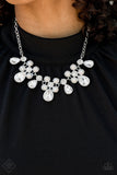 Fiercely 5th Avenue - Demurely Debutante - White Necklace  A sparkling collection of classic round and dramatic teardrop-shaped rhinestones fan out along the collar in a dazzling display. Timeless white pearls are sprinkled along the clusters of rhinestones, adding a beautiful refinement to the design. Features an adjustable clasp closure.  Sold as one individual necklace. Includes one pair of matching earrings.