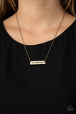 Land Of The Free - Brass - Paparazzi Accessories  Stamped in the phrase, "Land of the free," a brass rectangular frame is suspended by a dainty brass chain below the collar for a patriotic inspired look. Features an adjustable clasp closure.  Sold as one individual necklace. Includes one pair of matching earrings.  PATRIOTIC 