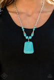 Simply Santa Fe - Sandstone Oasis -Blue Necklace - Paparazzi Accessories  Swinging from the bottom of a shimmery silver chain, a collection of ornate silver accents and polished turquoise stone beads are threaded along an invisible wire that falls just below the collar. A flat, oversized squared turquoise stone pendant swings from the bottom of the design in a statement-making finish. Features an adjustable clasp closure.  Sold as one individual necklace. Includes one pair of matching earrings.  December '1