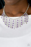 Harlem Hideaway - Purple - Paparazzi Accessories  Infused with purple beaded tassels, shimmery silver chains stream below the collar, creating a colorful fringe. Features an adjustable clasp closure.  Sold as one individual necklace. Includes one pair of matching earrings.