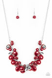 Battle of the Bombshells - Red - Paparazzi Accessories  Sprinkled with faceted and shiny silver beaded accents, a bubbly collection of round, oval, and flat red pearls cluster below the collar for a statement-making finish. Features an adjustable clasp closure.  Sold as one individual necklace. Includes one pair of matching earrings.  P2RE-RDXX-181XX