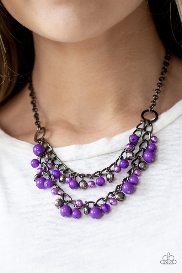 Watch Me Now - Purple - Paparazzi Accessories  Pearly and polished purple beading joins faceted gunmetal beads along a bold gunmetal chain, creating a sassy fringe below the collar. Features an adjustable clasp closure.  Sold as one individual necklace. Includes one pair of matching earrings.  Get The Complete Look! Bracelet: 