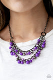 Watch Me Now - Purple - Paparazzi Accessories  Pearly and polished purple beading joins faceted gunmetal beads along a bold gunmetal chain, creating a sassy fringe below the collar. Features an adjustable clasp closure.  Sold as one individual necklace. Includes one pair of matching earrings.  Get The Complete Look! Bracelet: "Hold My Drink - Purple" (Sold Separately)