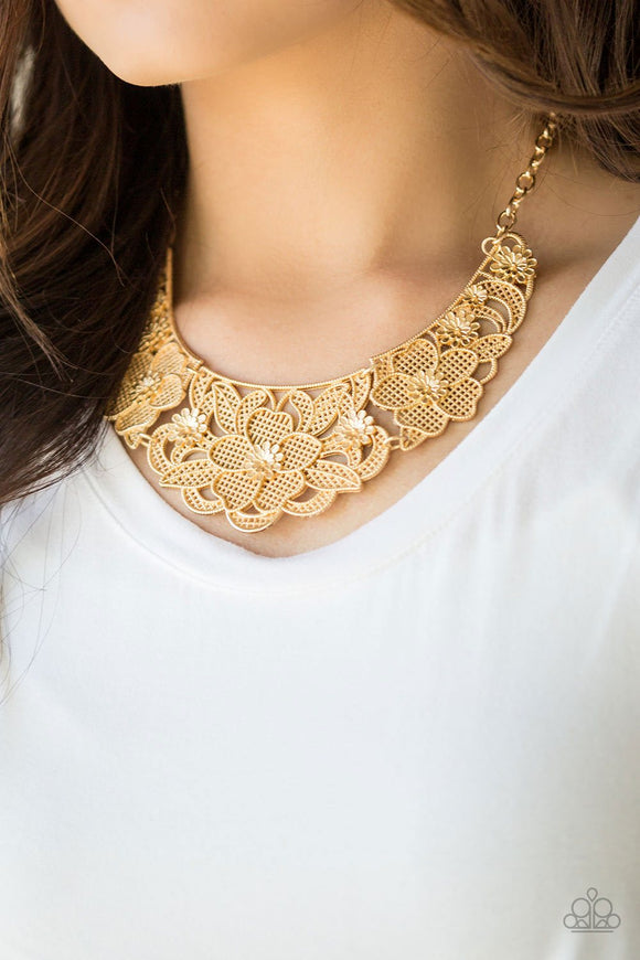 Petunia Paradise - Gold - Paparazzi Accessories FEATURING LATTICE-LIKE PATTERNS, SHIMMERY GOLD FLOWERS BLOOM BELOW THE COLLAR FOR A SEASONAL LOOK. FEATURES AN ADJUSTABLE CLASP CLOSURE. Sold as one individual necklace. Includes one pair of matching earrings.