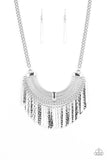 Impressively Incan - Silver - Paparazzi Accessories HAMMERED IN SHIMMERY TEXTURES, FLARED SILVER PLATES SWING FROM THE BOTTOM OF AN ORNATE HALF-MOON FRAME, CREATING AN EDGY FRINGE BELOW THE COLLAR. FEATURES AN ADJUSTABLE CLASP CLOSURE. Sold as one individual necklace. Includes one pair of matching earrings. (Egyptian, tribal)