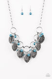 Very Valentine - Blue - Paparazzi Accessories - Item #P2WH-BLXX-352XX Infused with classic blue pearls, vintage locket-like heart frames swing from the bottoms of bold silver hoops, creating a flirtatious fringe below the collar. Features an adjustable clasp closure.  Sold as one individual necklace. Includes one pair of matching earrings.