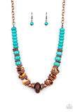 Desert Tranquility - Copper / Blue - Paparazzi Accessories - P2SE-CPXX-123XX An earthy collection of dainty copper accents, rounded turquoise stone beads, and spotted ceramic-like beads are threaded along an invisible wire below the collar. An earthy wooden bead adorns the center, adding an authentic artisan flair to the seasonal display. Features an adjustable clasp closure.  Sold as one individual necklace. Includes one pair of matching earrings.