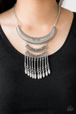 Eastern Empress - Silver - Paparazzi Accessories  Item #P2TR-SVXX-103XX Stamped and embossed in tribal inspired patterns, three silver plates connect down the chest, creating a fiercely stacked pendant. Attached to twisted silver rods, ornate silver beads swing from the bottom of the lowermost plate, creating an eye-catching fringe. Features an adjustable clasp closure.  Sold as one individual necklace. Includes one pair of matching earrings.