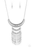 Eastern Empress - Silver - Paparazzi Accessories  Item #P2TR-SVXX-103XX Stamped and embossed in tribal inspired patterns, three silver plates connect down the chest, creating a fiercely stacked pendant. Attached to twisted silver rods, ornate silver beads swing from the bottom of the lowermost plate, creating an eye-catching fringe. Features an adjustable clasp closure.  Sold as one individual necklace. Includes one pair of matching earrings.