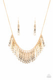 Metallic Muse - Gold - Paparazzi Accessories -  Item #P2ST-GDXX-091XX Hammered in blinding detail, golden rectangular plates swing from the bottom of a classic gold chain, creating an edgy metallic fringe below the collar. Features an adjustable clasp closure.  Sold as one individual necklace. Includes one pair of matching earrings.