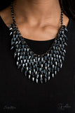 The Heather - 2020 Zi Signature - Paparazzi Accessories Row after row of metallic blue beads (also known as our "Oil Spill") swing from an edgy net of glistening gunmetal links, layering into an edgy fringe below the collar. Featuring flashy faceted edges, the mesmerizing beads spark and sizzle into a conflagration of sparkle below the collar. Features an adjustable clasp closure.  Named after 2020 Rock the Runway winner, Heather M.  Sold as one individual necklace. Includes one pair of matching earrings.