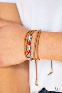 Clear A Path - Red An array of red and silver beads are knotted in place along elongated suede cording for a wanderlust fashion. To secure bracelet, tie ends in place around the wrist at desired length.  Sold as one individual bracelet.