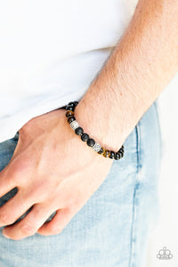 Proverb - Brown Infused with ornate silver accents, an earthy collection of glassy black beads, tiger's eye stone beads, and black lava rock beads are threaded along a stretchy band around the wrist for a seasonal look.  Sold as one individual bracelet.