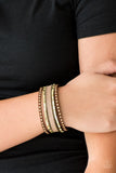 Seize The Sass - Brass/Brown Shimmery brass studs, dainty brass chains, and golden emerald style cut rhinestones are encrusted along a brown suede band dusted in a sparkling center for a sassy look. Features an adjustable snap closure.  Sold as one individual bracelet.