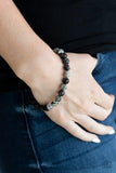 Turned In - Silver - Paparazzi Accessories -  A collection black lava rock beads, smoky stone beads, and ornate silver accents are threaded along a stretchy band around the wrist for a seasonal look.  Sold as one individual stretchy bracelet.