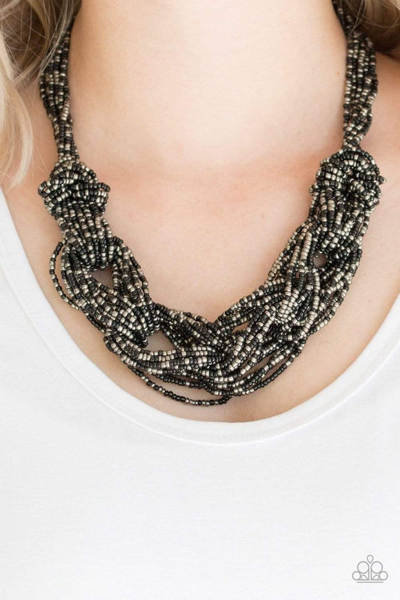 City Catwalk - Black - Paparazzi Accessories -   Brushed in a flashy finish, countless strands of black and gunmetal seed beads weave into a bulky square braid below the collar for a glamorous look. Features an adjustable clasp closure.  Sold as one individual necklace. Includes one pair of matching earrings.